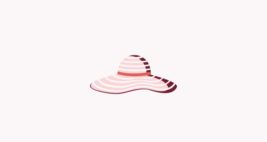 How to pack a pumping bag for holiday - Floppy hat on pink background