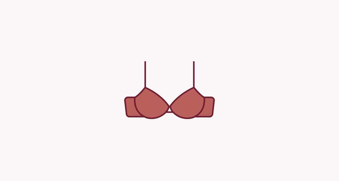 Common Questions About Flange Sizing - Pink bra on brown background