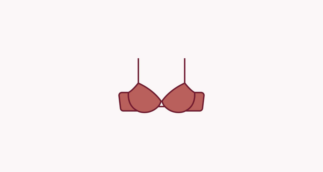 Common Questions About Flange Sizing - Pink bra on brown background